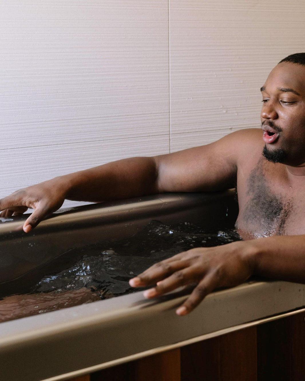 person enjoying a cold plunge tub for home by Coldtub